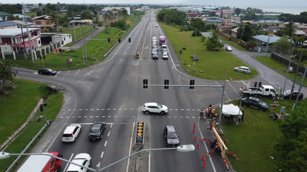 Aerial view of a large signalized intersection and surrounding roadway